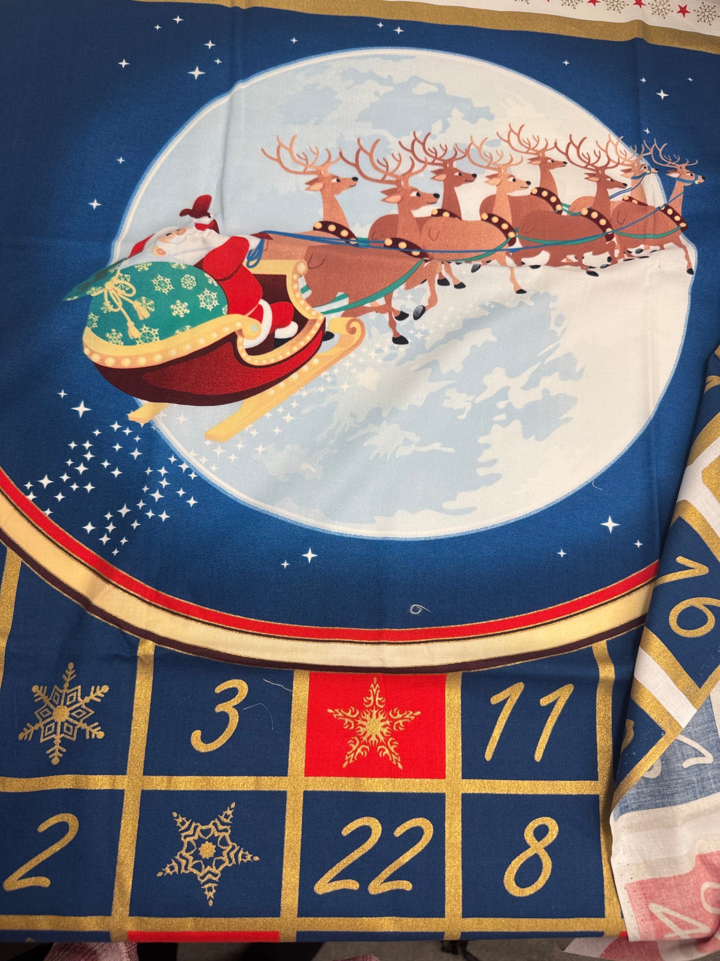 Santa on his Sleigh Christmas Fabric Advent Calendar Panel Blue and Gold