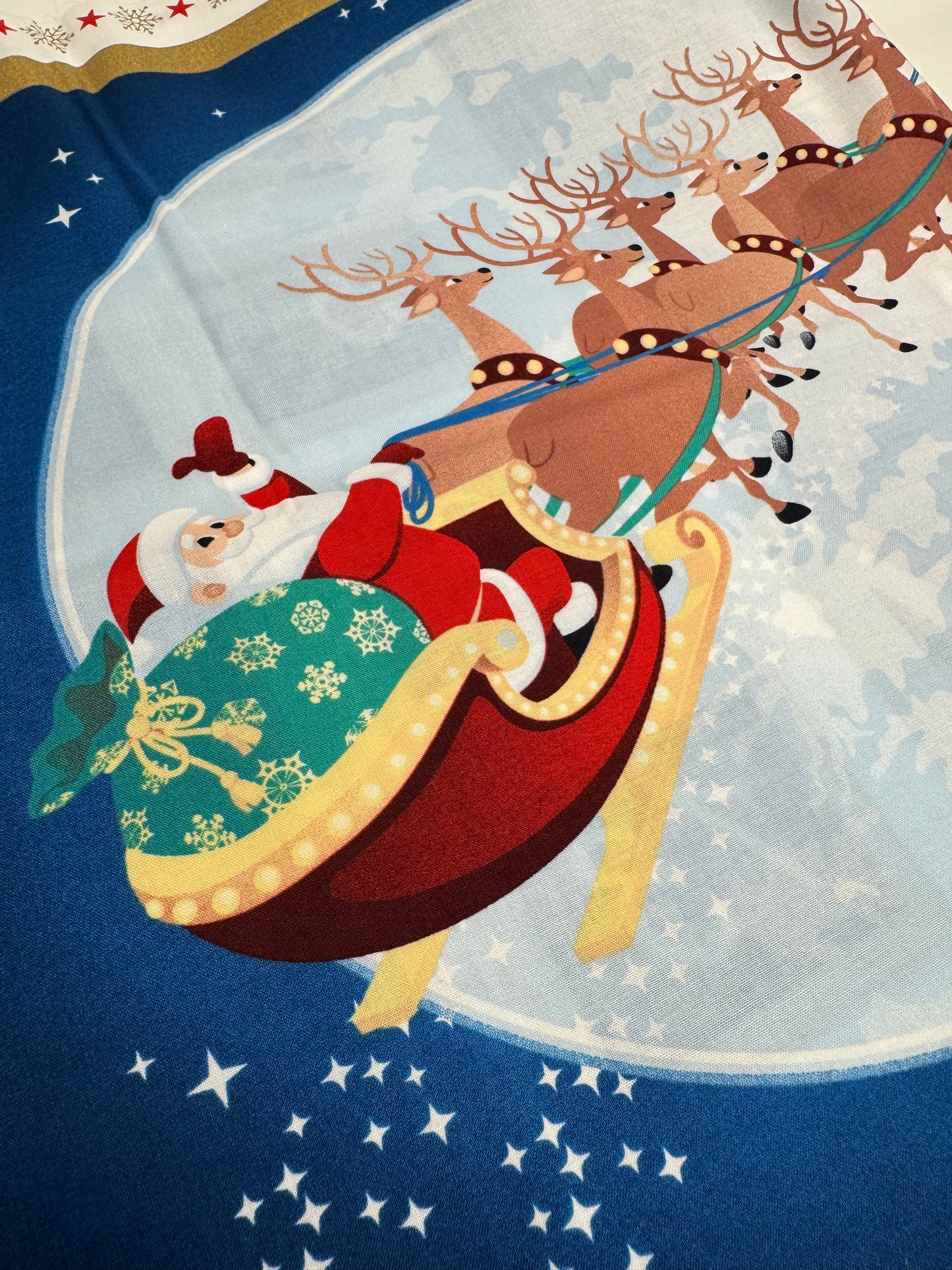 Santa on his Sleigh Christmas Fabric Advent Calendar Panel Blue and Gold